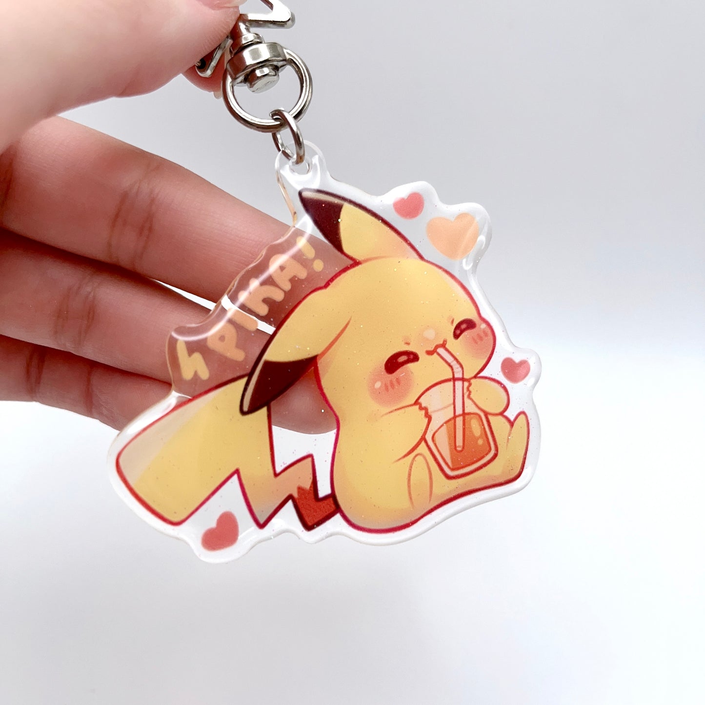 Pika Drinking Juice Glitter Keychain